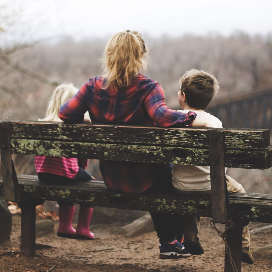 A hand holding up cash