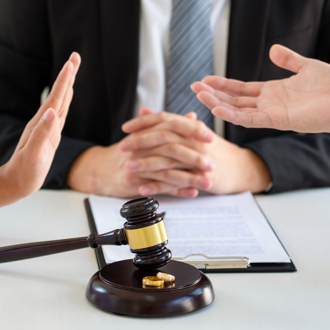 two people talking in front of a judge