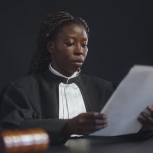 a judge looking at paperwork