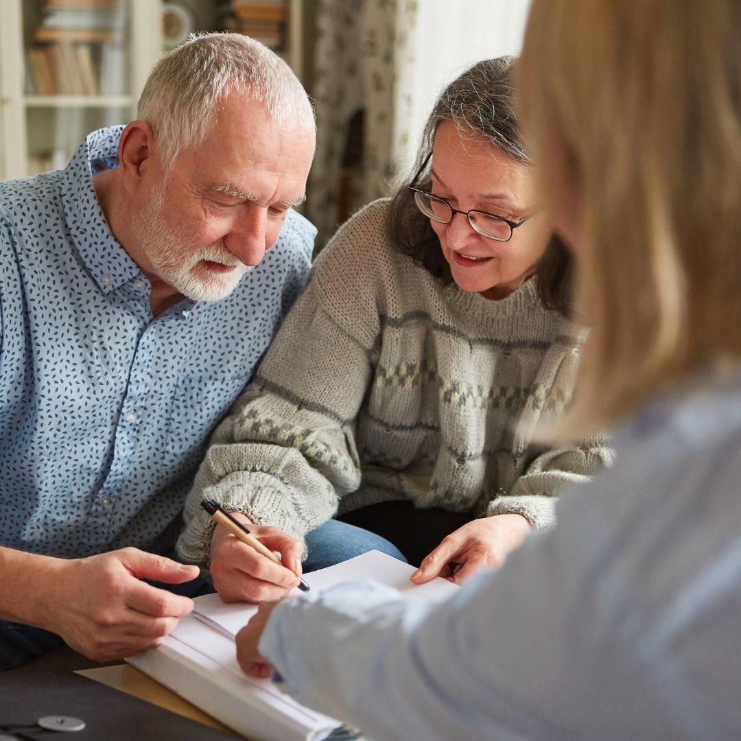 older couple looking over paperwork