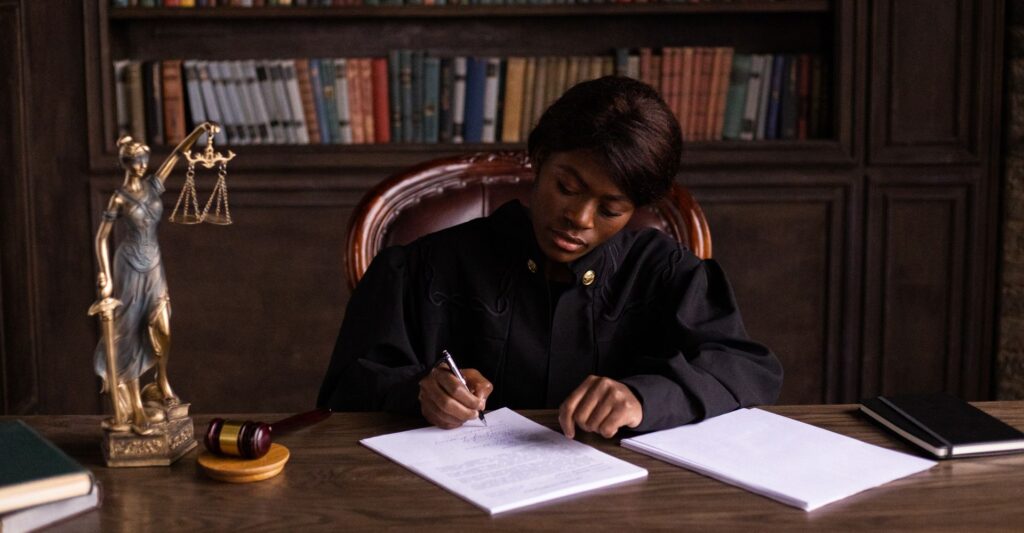 a judge taking notes