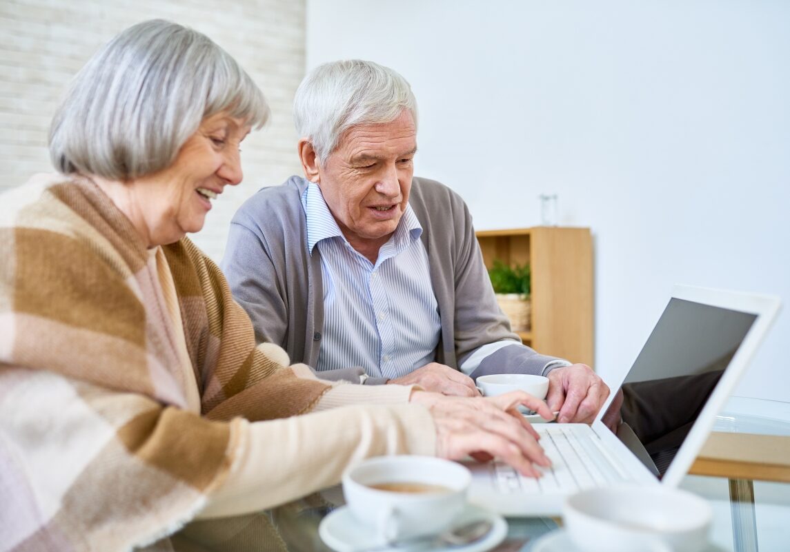 an older couple reviewing legal documents.