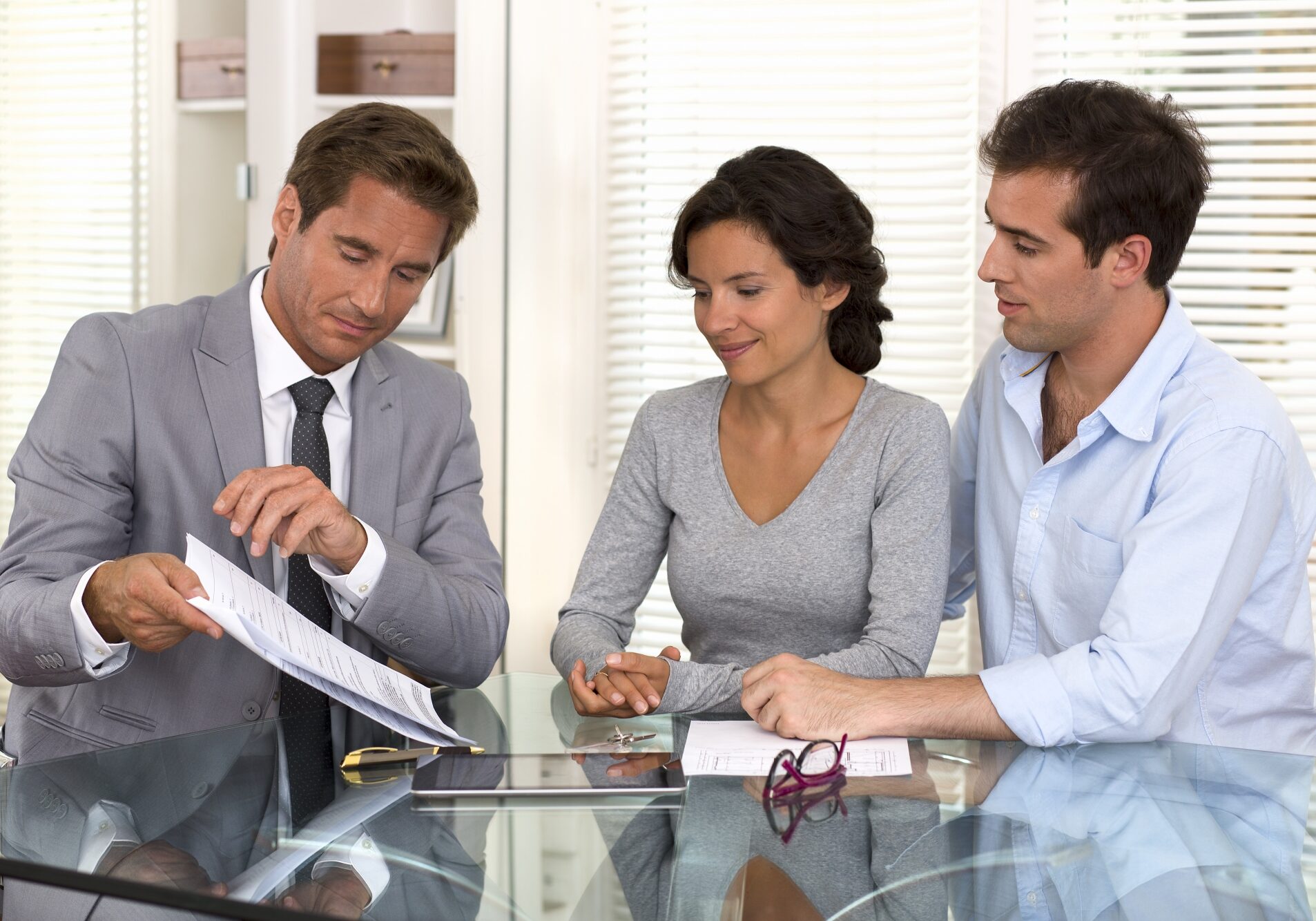 Image of a couple working with an estate lawyer.